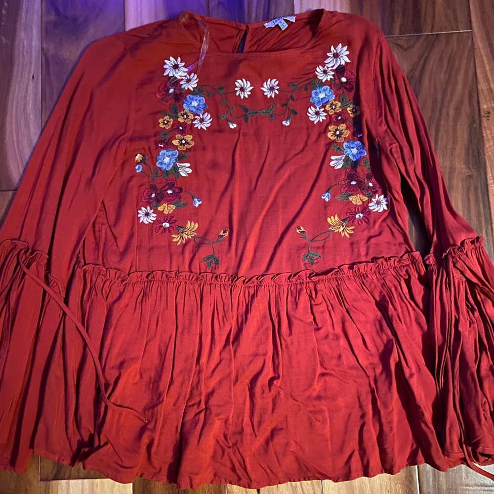 Small deep red blouse